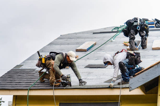 Professional Roofing technician working in Carolina, RI